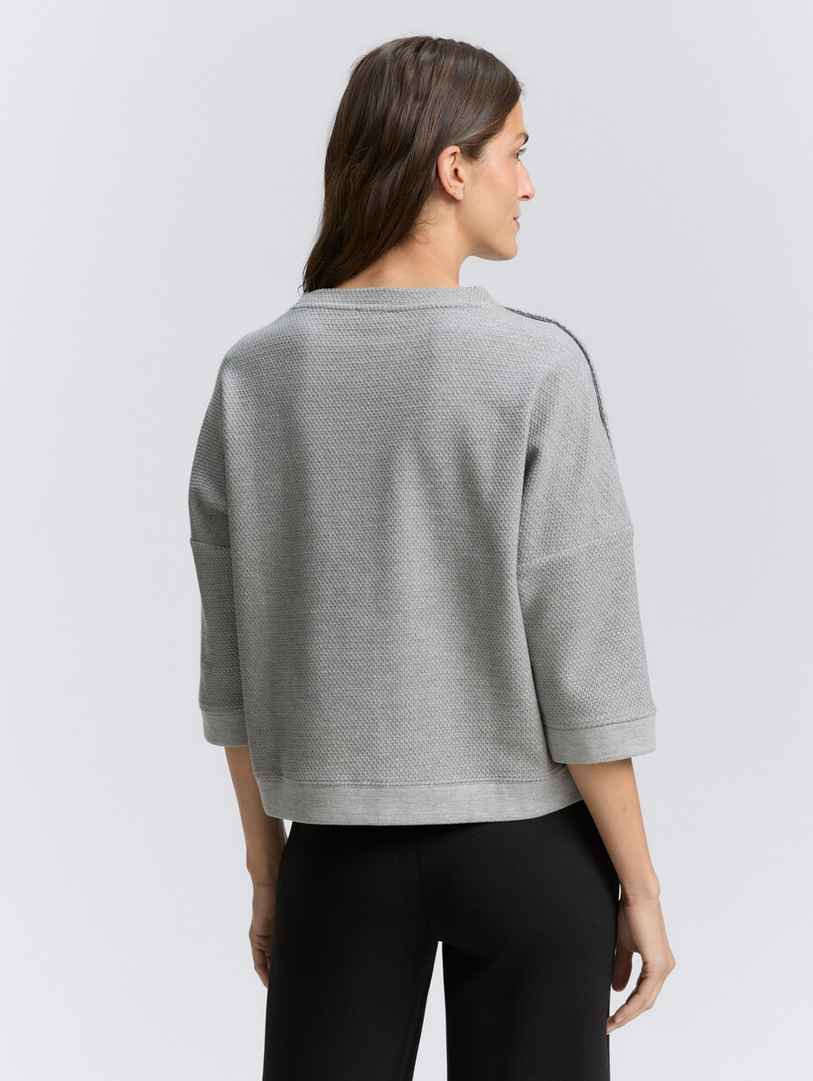 sweatshirt mit knopfdetails