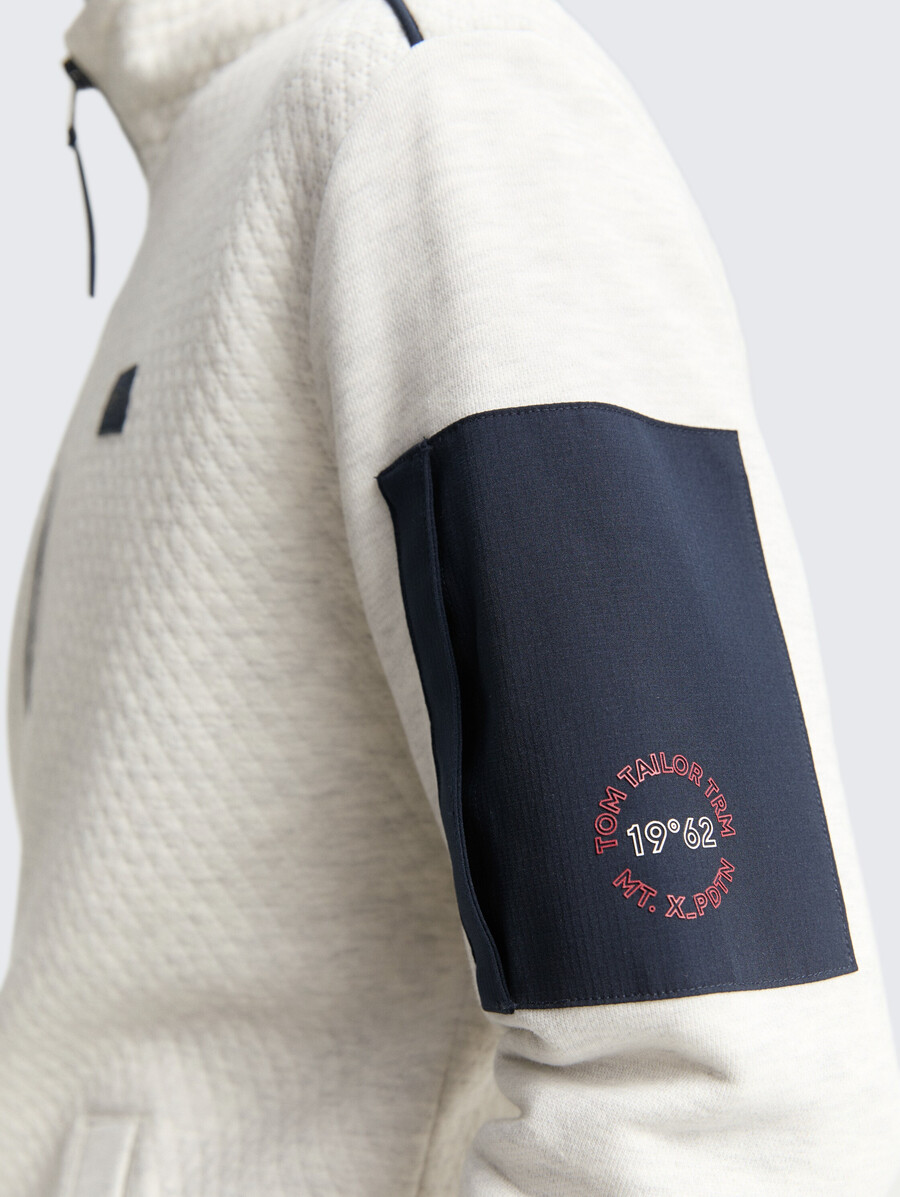 sweatjacke mit Ärmeltasche