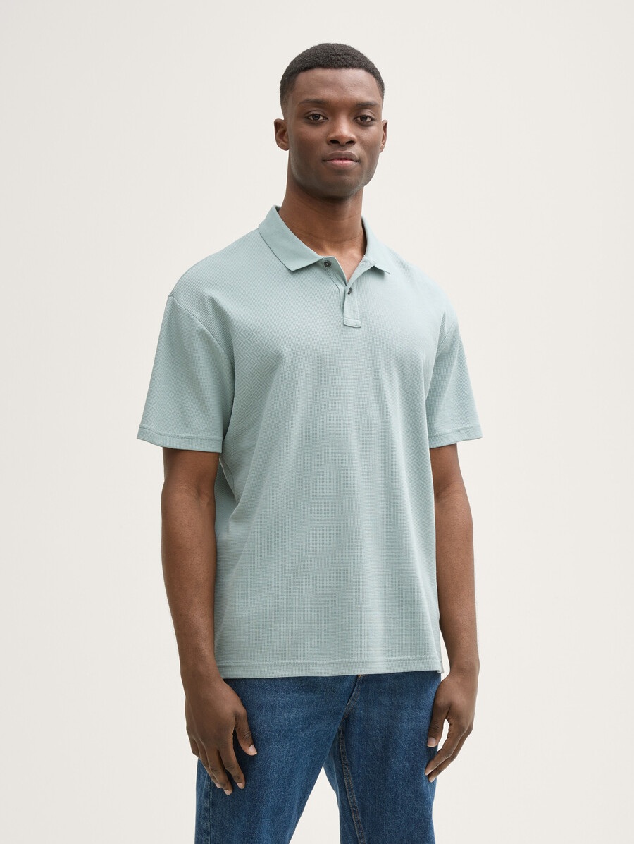 poloshirt mit lockerer passform und waffelstruktur
