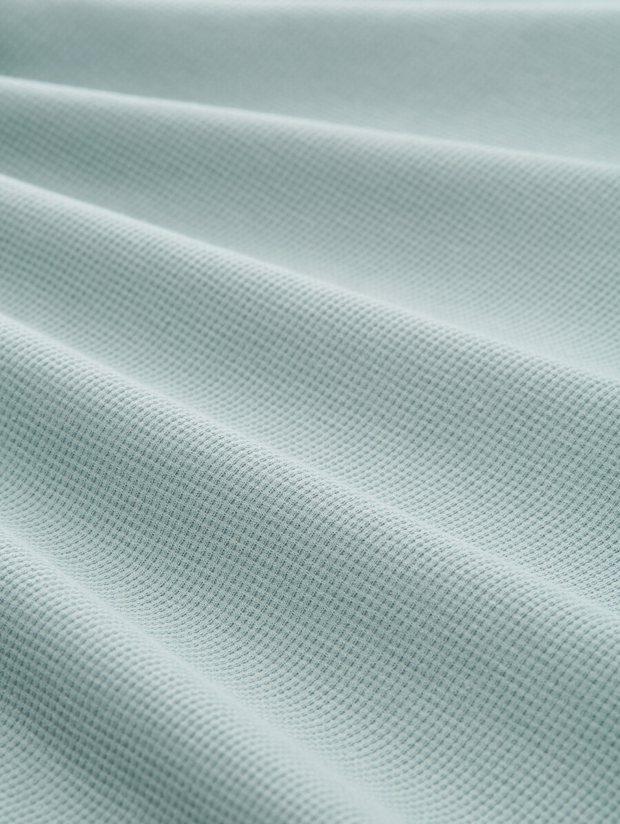 poloshirt mit lockerer passform und waffelstruktur